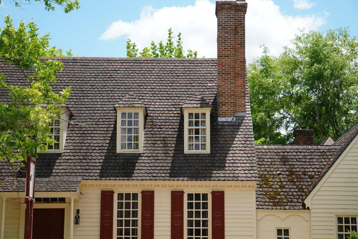Colonial home with a new dark architectural shingle roof